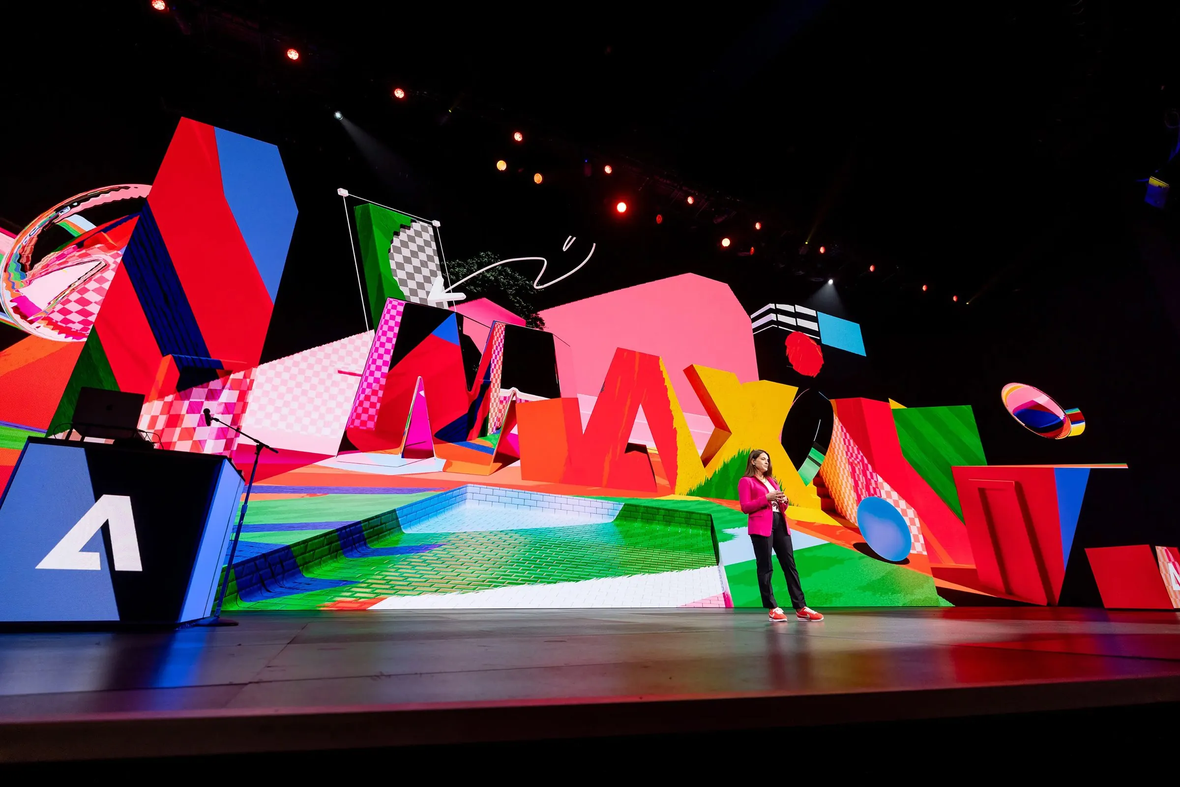 Adobe MAX main stage with the animated MAX visuals